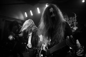 Black Metal band Inverted Saint live with guitar players singer and bass player